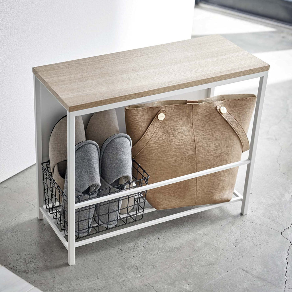 Yamazaki entryway magic strikes again! If you’re struggling to find a place for some of your bulkier entryway items, this stylish organizer and entryway bench is for you. 