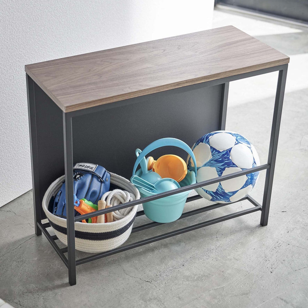 This compact organizer is the perfect solution for those entryway items that don’t quite make it to the closet. Give your gardening goods, kids’ outdoor toys, pet gear, and other frequently used items a proper home that’s still within easy reach.