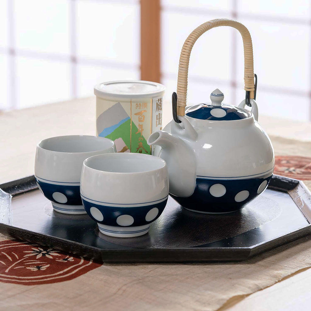 Mizutama teaware is now a staple and symbol for the Japanese dining table. Soesen Kiln craftsmen continue the traditional technique of hand making every part of the tea ware and hand-carving each piece to create the indented polka-dot design. 