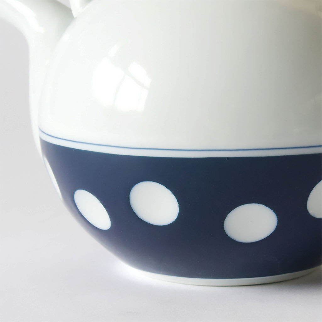Soesen Mizutama Teapot and Cup Collection. Mizutama means "polka dots" in Japanese. Synonymous with Hizen Yoshida ware, this pattern is attributed to white stones at the bottom of the Narutani River in the upper stream of Haguchi River running through Yoshida village. Mizutama teaware is now a staple and symbol for the Japanese dining table.