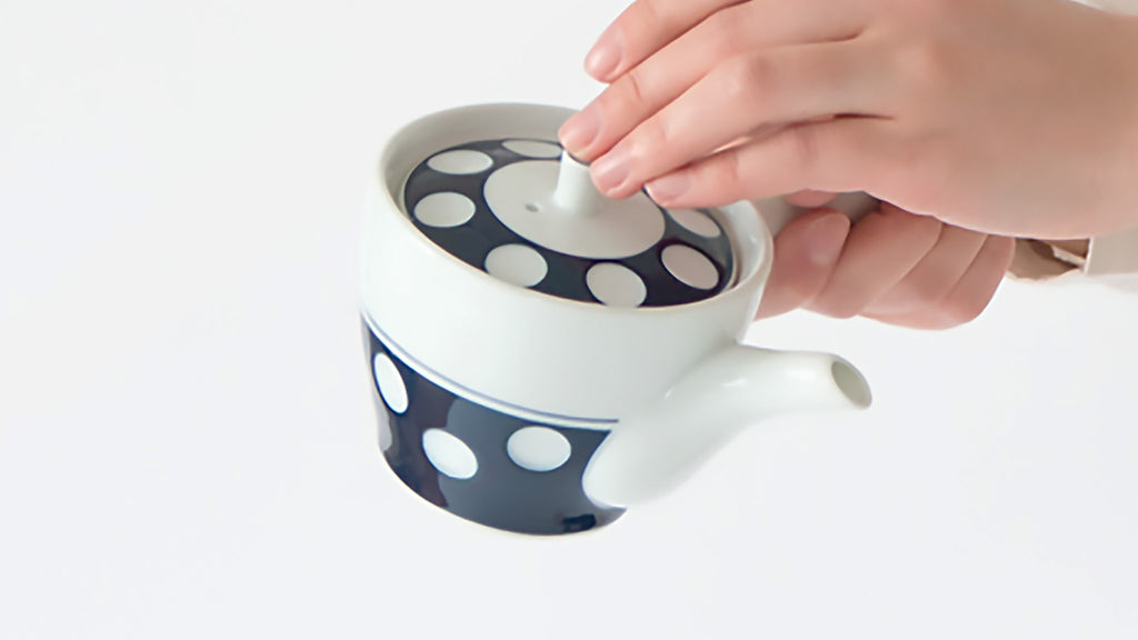 Soesen Kiln craftsmen continue the traditional technique of hand making every part of the tea ware and hand-carving each piece to create the indented polka-dot design. SKU 62497 Soesen Mizutama Kyushu (Side Handle) Teapot.