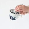 SKU 62497 Soesen Mizutama Kyushu (Side Handle) Teapot. Mizutama Maru Dobin and Mizutama Kyushu teapots include integrated debeso (half-sphere) filter. Made in Japan. Recipient of Good Design Award.