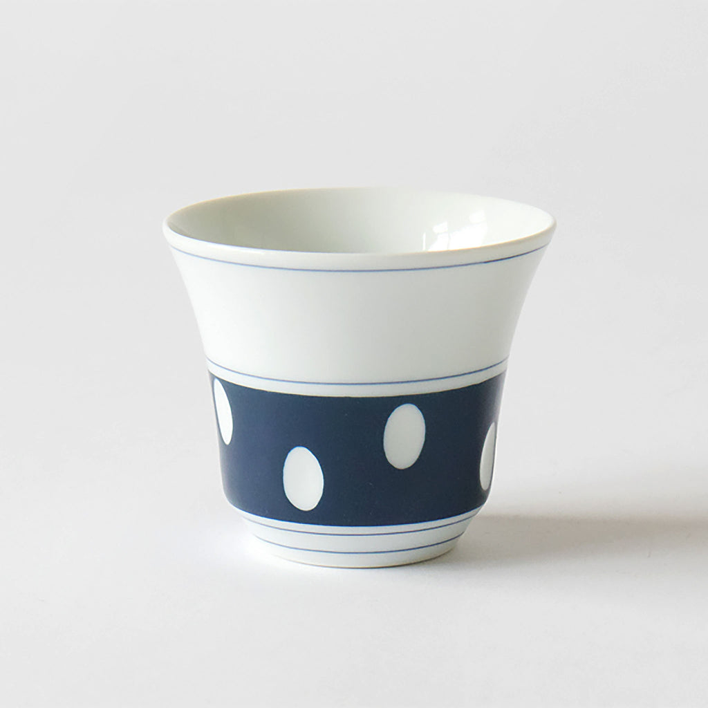 Soesen Mizutama Flared Teacup is made from Hizen Yoshida ware, with its evenly lined polka dot design that makes you feel nostalgic, is a slightly new design that fits the modern life scene. The teacup has a refined size that fits in the palm of your hand. It is soft to the touch and perfect for entertaining guests.