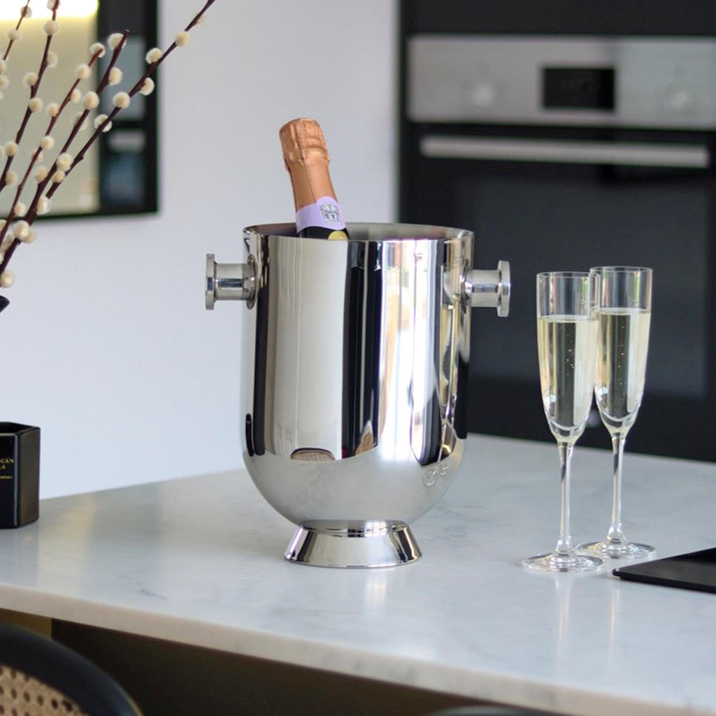 TROMBONE CHAMPAGNE BUCKET - SKU NM00047. Luxury stainless steel champagne bucket that is guaranteed to catch the eye in any home.