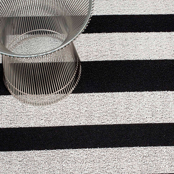Chilewich Shag Bold Stripe Black and White. SKU 200126-002. UPC 0667880108822. A Chilewich signature, this easy-care floor mat combines a graphic pattern and inviting texture with enduring performance, indoors or out. 
