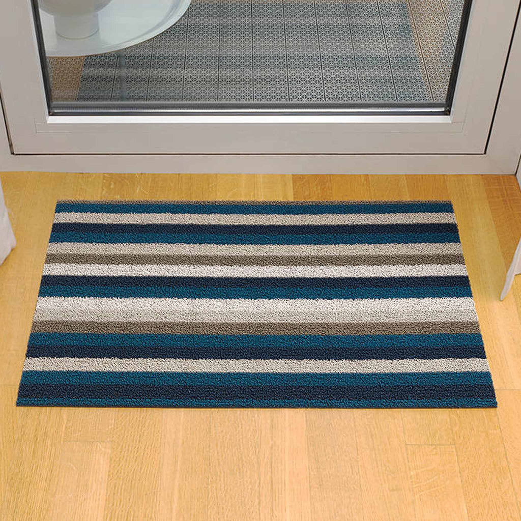 With the sturdiness of an all-weather doormat and the plush good looks of a rug, Shag mats bring texture and traction to any space. Even Stripe Doormat 18" x 28" / 46 x 71 cm Marine 200128-00. UPC 0667880915789.