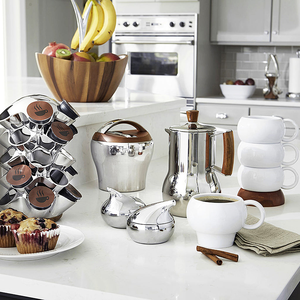 Nambé has redefined functional art, blending mid-century modern sensibilities with innovative craftsmanship. From our iconic alloy serveware, known for its lustrous finish and the temperature retention properties, to our expanded collections in wood, stainless steel, and ceramics, we’ve collaborated with some of the world’s most esteemed designers to bring style and purpose into homes. Many of our pieces have graced the permanent collections of renowned institutions.