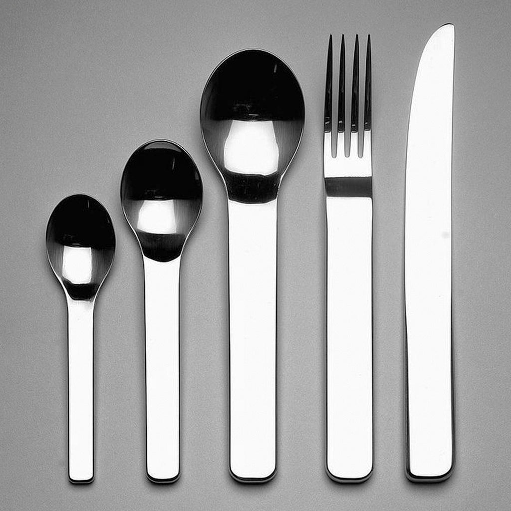 David Mellor’s Minimal cutlery comprising:  1 table knife 1 table fork 1 soup spoon 1 dessert spoon 1 tea spoon. The sculptural shaping and the weight of the satin polished metal give this cutlery a very sophisticated and luxurious feel. SKU 4992813. 