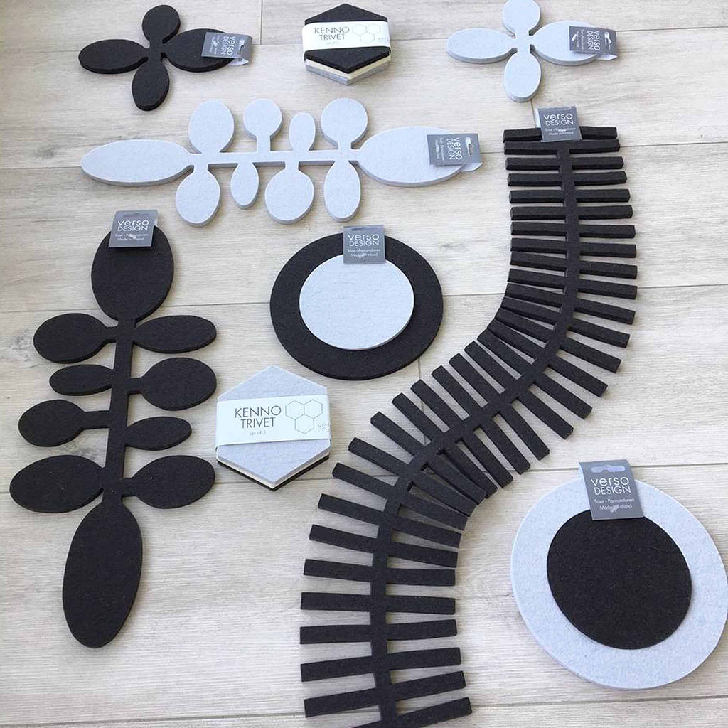 These trivets and table runners are from Verso Design, a Finnish design house that specializes in modern textiles and innovative home accessories inspired by nature. The Olki design features shapes laser-cut from thick, felted wool.