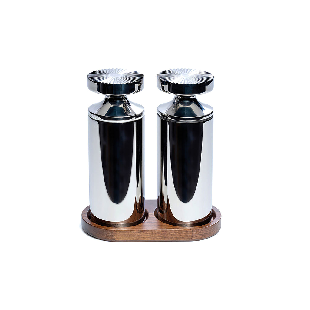 The mills are available individually or can be bought as a set with a walnut stand.