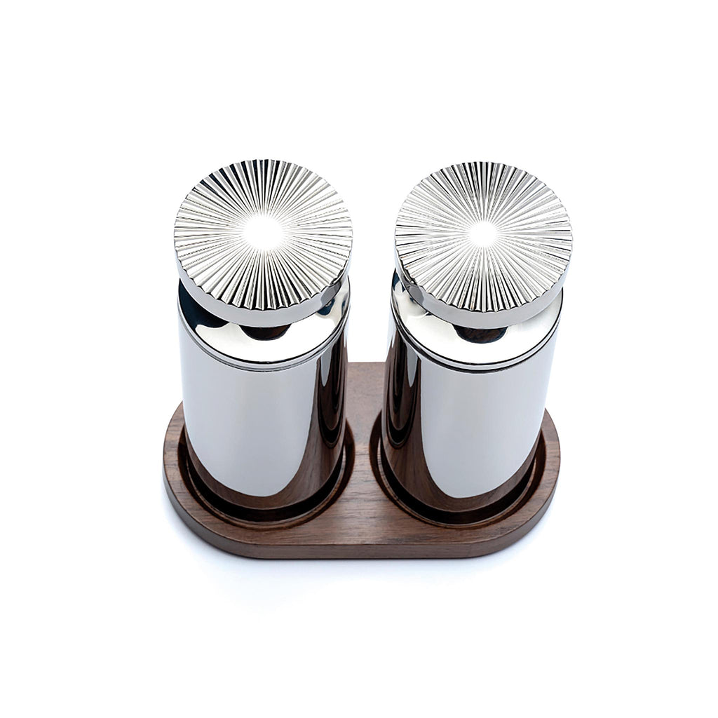 Their unusual, precision machined tops are a contemporary interpretation of a cog, reflecting their grinding action and our industrial design heritage. Beautifully engineered for high-definition crispness, they feature a subtle black or white band to distinguish between salt and pepper at the table.