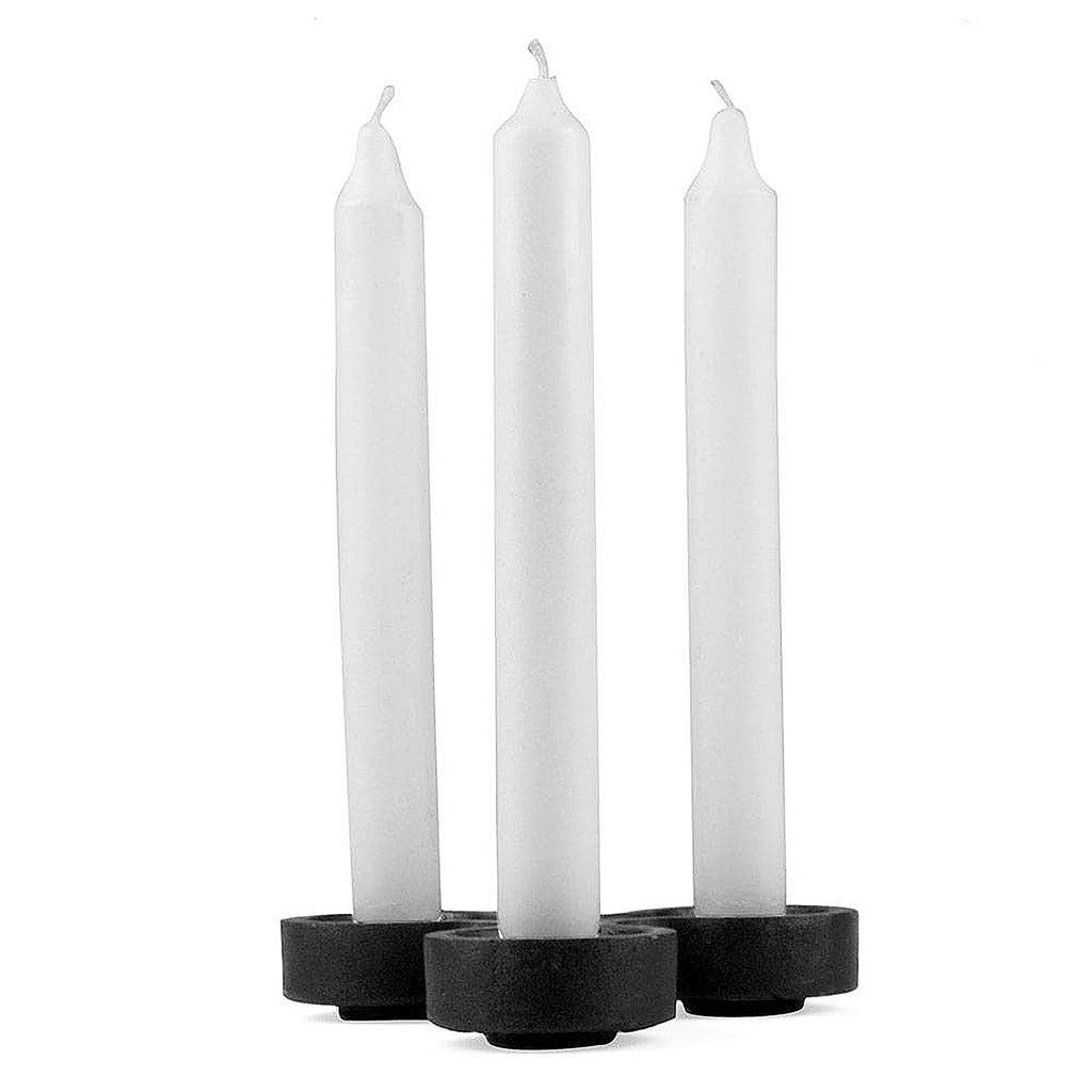 Designed to be used singly or assembled in different permutations to form a spectacular table setting.

Made in matt black with 3 holders. Underside of each candleholder is stamped 1972, the year of its design. Also available in bright red or as a 5-light version.