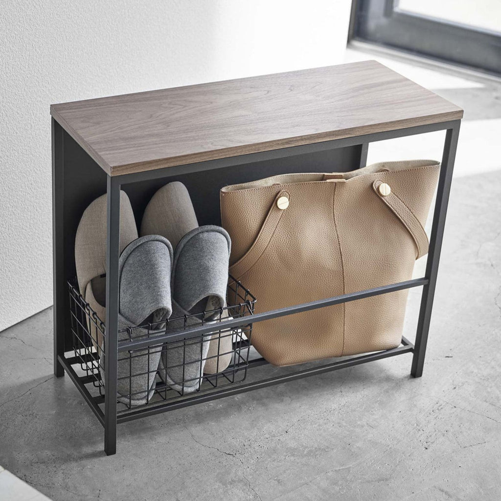 The steel and natural woodgrain top make for a handsome addition to your space. Use the top surface as a place for your plants or decoration, a pit stop for your handbags and purses while you get ready to head out, or as a bench.