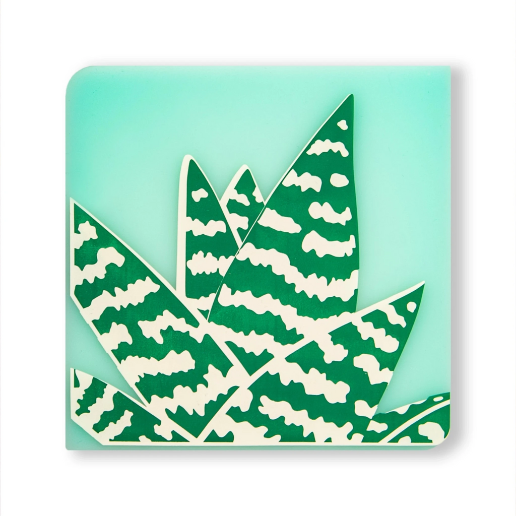 Tiger Aloe Conservatory Coaster by Sara Strand for modern-twist. modern-twist tiger aloe coaster delivers eco-friendly, elegant style to your home. protects your surfaces from heat & water damage with silky soft, memory-free silicone that never wears or tears. The non-porous & germ-free material repels the biggest spills & wipes clean with ease, leaving you free to enjoy the subtle designs & rich colors for many years to come.