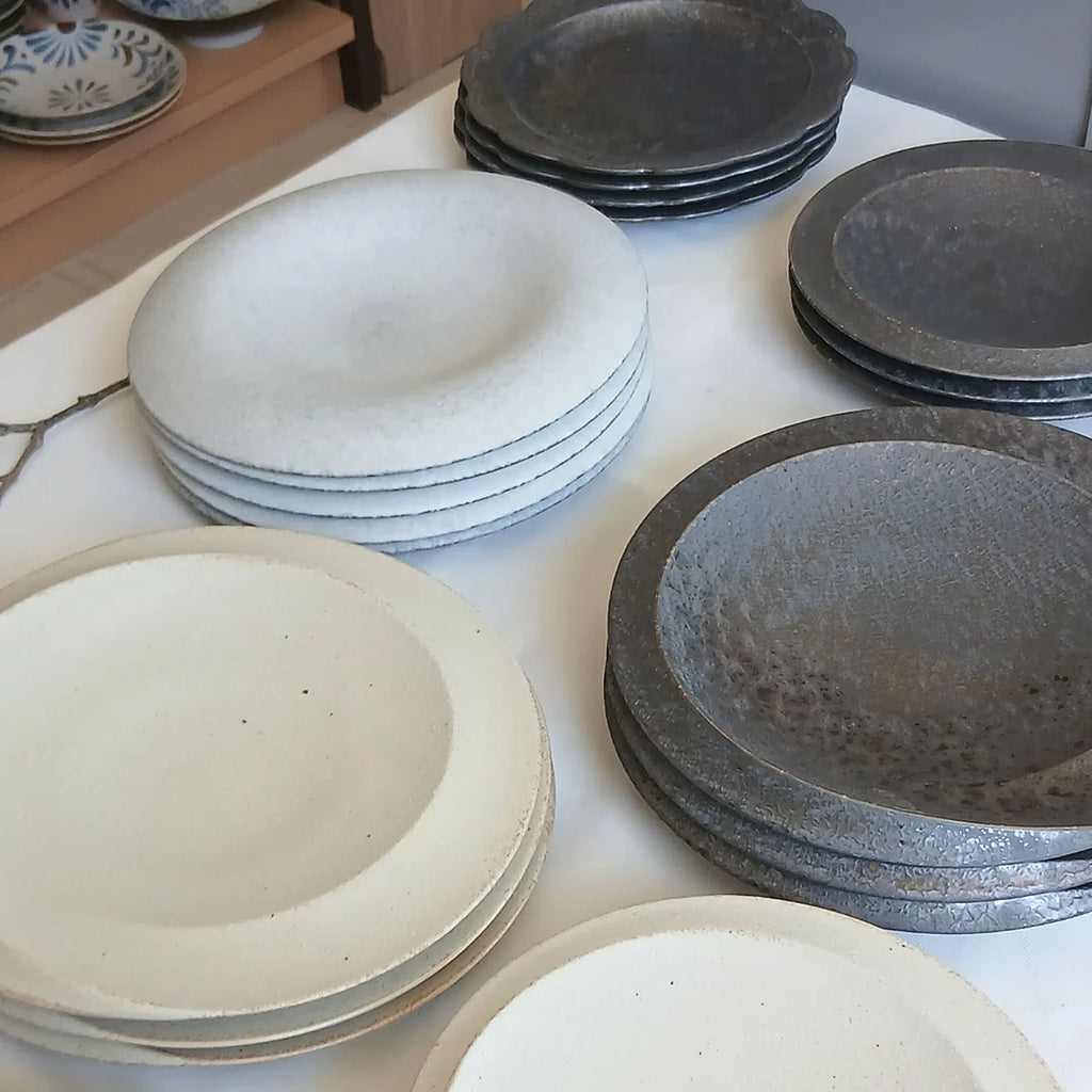 Confit Plate features beautiful curves and a smooth texture. It envelops and highlights your food. Simply place food in the center for an elegant presentation. The deep recesses make it suitable for serving dishes with lots of liquid.