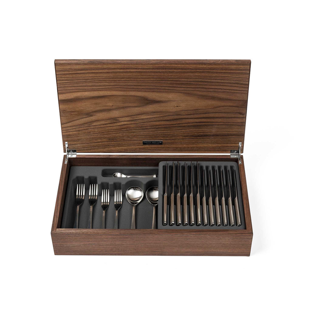 David Mellor Design Liner 44-piece cutlery canteen walnut by Corin Mellor. SKU 4994348. Handmade walnut canteen box containing:  6 table knives 6 dessert knives 6 table forks 6 dessert forks 6 soup spoons 6 dessert spoons 6 teaspoons 2 serving spoons.