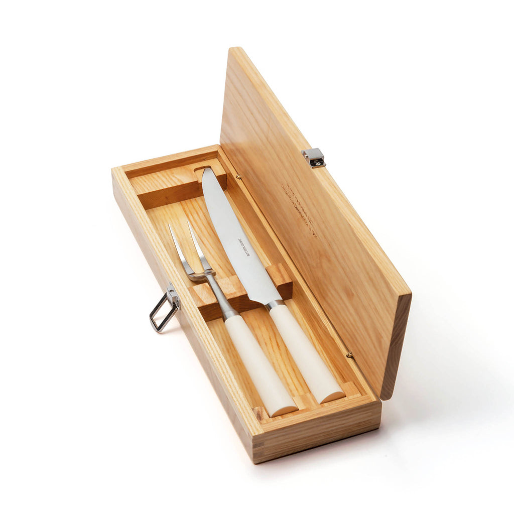 David Mellor Pride carving set. SKU 2518310. Comes in a solid ash case with hinged lid and clasp. Carving Knife 20cm. Carving Fork 25.5cm.