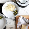 As well as timeless elegance, Falcon Enamelware has enduring strength. Enamelware is porcelain fused onto heavy-gauge steel, giving it many admirable qualities - durability, smoothness and chemical-resistance. It can assume brilliant, long-lasting colours, and cannot burn. If you drop it, it may chip but it won’t break. Dishwasher-safe and oven-safe up to 530F / 270C, it can also be used on gas and electric hobs. It can be stored in a freezer as long as there is no rapid change in temperature.