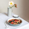 Falcon Enamelware Large Serving Dish in Pigeon Grey. Our larger serving dish is a statement piece for serving a feast. Oven safe, it can also be used for baked oatmeal or your favorite pie.