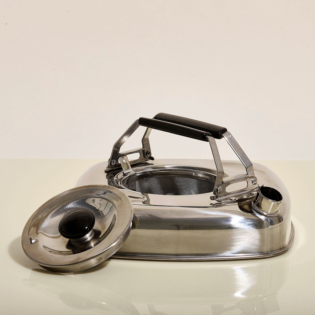 Made in Japan from stainless steel, this unusually shaped kettle has a flat, thin bottom that helps bring water to a boil faster than conventional kettles. 