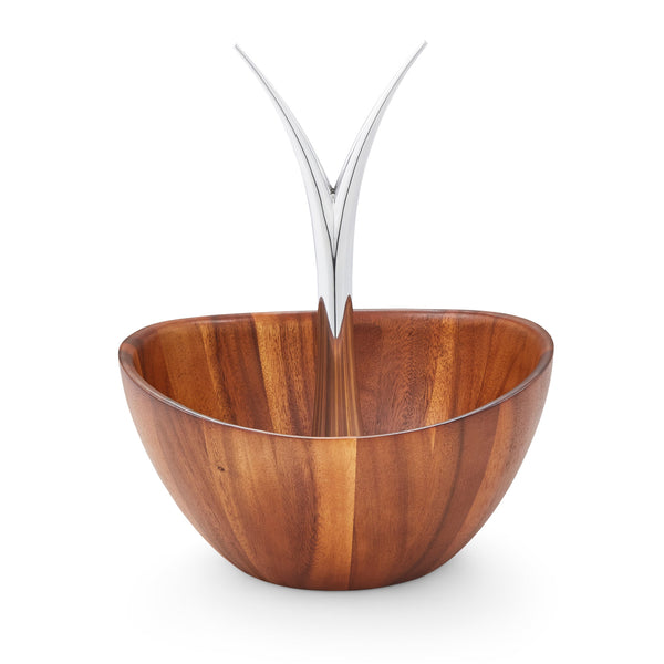 The Fruit Tree Bowl adds a delicious sense of fun and jubilation to the kitchen or dining room. Fill with seasonal produce and watch the fruit colors pop against the wood. The upward gesture of the branch centerpiece, and the shape of the bowl itself, give this unique piece an irresistibly playful spirit.