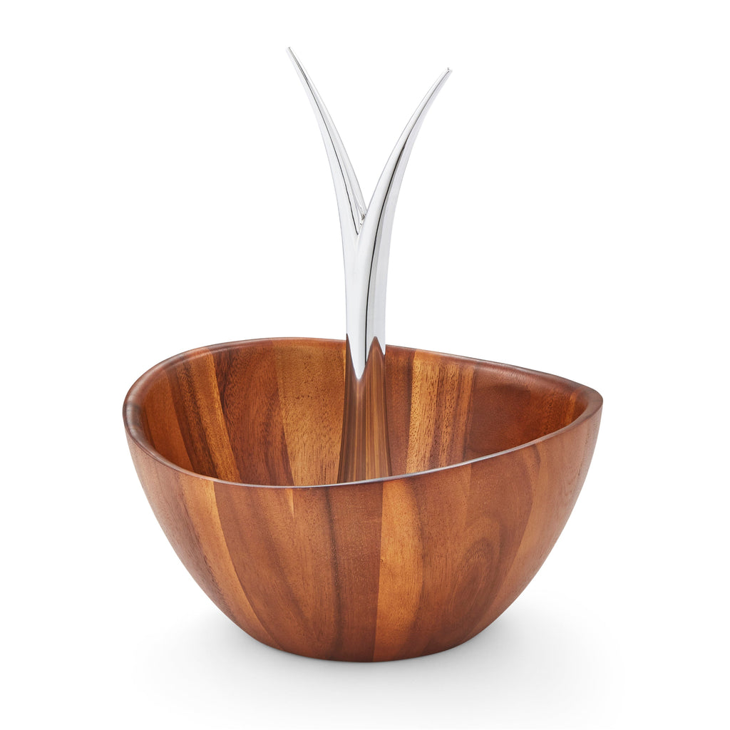 The Fruit Tree Bowl adds a delicious sense of fun and jubilation to the kitchen or dining room. Fill with seasonal produce and watch the fruit colors pop against the wood. The upward gesture of the branch centerpiece, and the shape of the bowl itself, give this unique piece an irresistibly playful spirit.