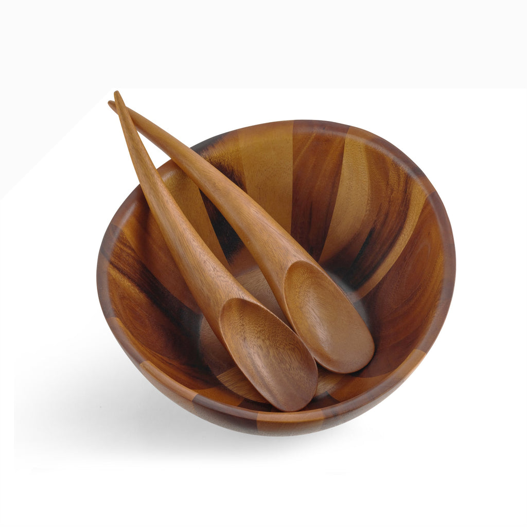 Elegant lines and flowing curves done in rich, gorgeous acacia wood make the Harmony Salad Set an instant classic. The generously rounded bowl paired with the unique shape of the tongs make it easy to toss and arrange your healthy creations.