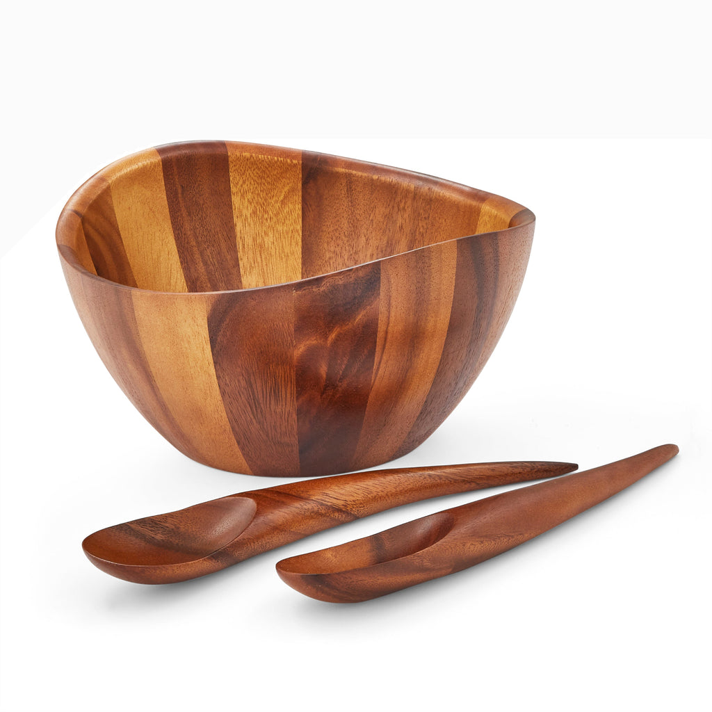 Elegant lines and flowing curves done in rich, gorgeous acacia wood make the Harmony Salad Set an instant classic. The generously rounded bowl paired with the unique shape of the tongs make it easy to toss and arrange your healthy creations.