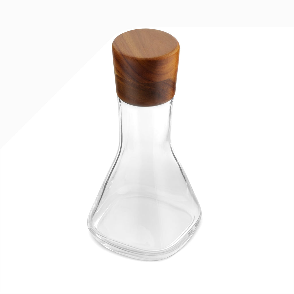Update the classic bar with contemporary design. The combination of the Vie Decanter’s square, glass body and rounded, wood stopper make this piece a style-standout. Fill with wine, whiskey, or any other spirit and set out on your bar to be admired.
