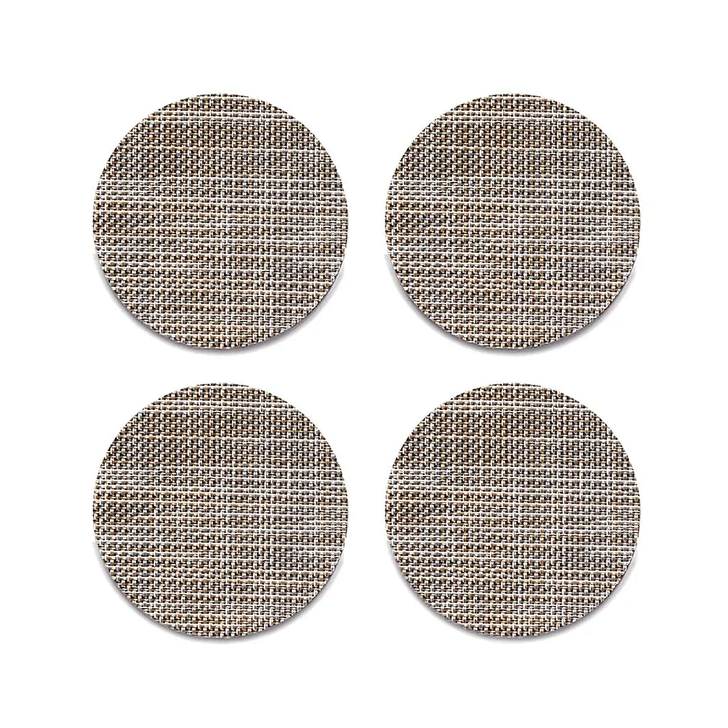 Chilewich Mini Basketweave Soapstone Coasters (Set of 4). SKU 100743-017. A plush, protective layer of our BioFelt® backing cushions these durable yet refined coasters. Elegantly banded in sets of four, they are ready for gifting. Made from recycled fibers, the cushioned base layer protects the underlying surface from moisture. Each coaster set includes four coasters in a single color. Suitable for indoor and outdoor use. Made in the USA. Free of phthalates.
