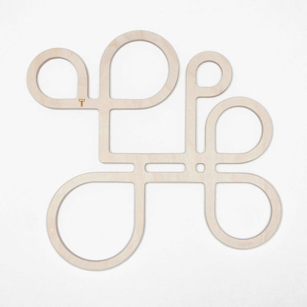 Decorate your table and protect the tablecloth with Inside Out wood trivets by Anne Thomas of TOMA Objects. Made of natural finish birch plywood. (A trivet is an object between a hot pan or serving dish and the table or countertop.) They have great heat resistance and prevent damage to surfaces caused by high heat.