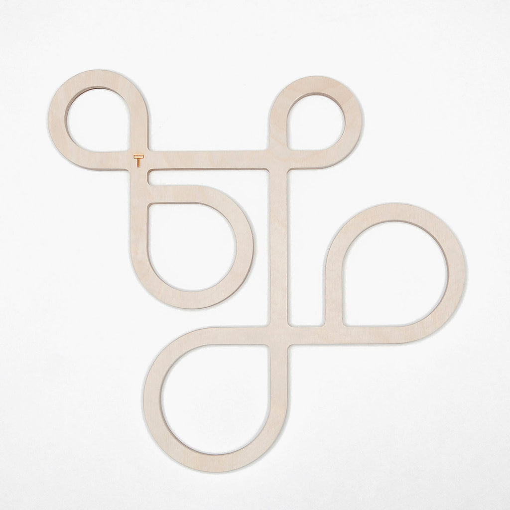 Decorate your table and protect the tablecloth with Inside Out wood trivets by Anne Thomas of TOMA Objects. Made of natural finish birch plywood. (A trivet is an object between a hot pan or serving dish and the table or countertop.) They have great heat resistance and prevent damage to surfaces caused by high heat.