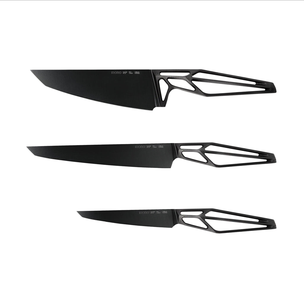 Mono SK59 Black set of 3. This set consists of Mono SK59 Black chef's knife, ham slicer and utility knife. Completely in black, this is how the variant of the high-end knife series Mono SK59 presents itself. The blade made of high-performance Sandvik 12C27TM steel is covered with a layer of so-called "Diamond-Like Carbon" (DLC).