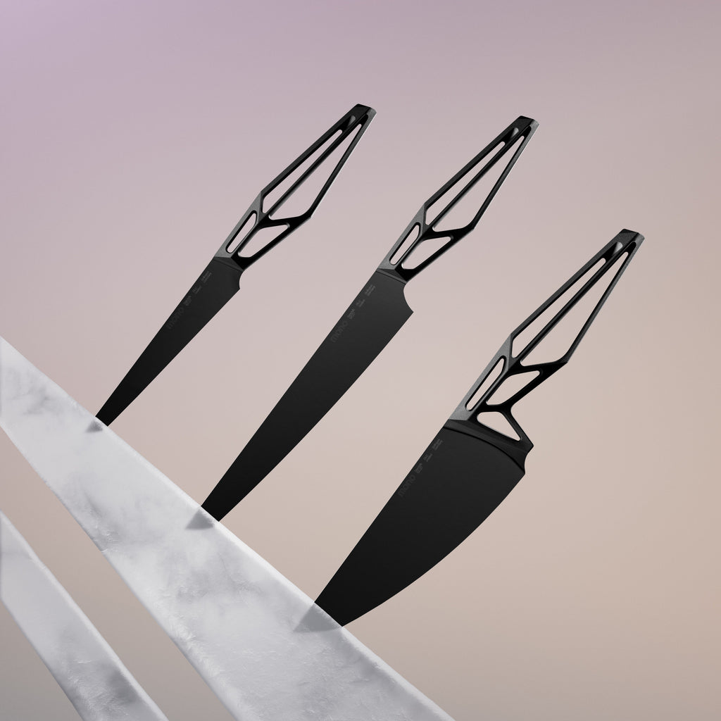 This set consists of Mono SK59 Black chef's knife, ham slicer and utility knife. Completely in black, this is how the variant of the high-end knife series Mono SK59 presents itself. The blade made of high-performance Sandvik 12C27TM steel is covered with a layer of so-called "Diamond-Like Carbon" (DLC).