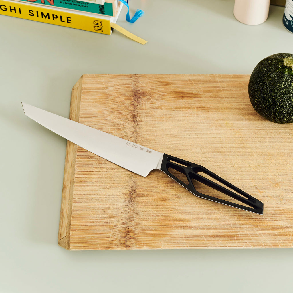 Mono SK59 ham slicer. SKU 59124. Mono SK59 ham slicer has a 21 cm long blade and a total length of 34 cm. With the extra fine cutting edge, roasts and other meat can also be cut perfectly.