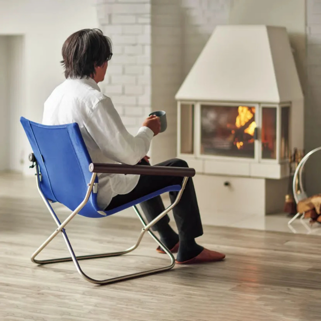 The chair is so comfortable, you forget it is a folding chair. The comfort comes from a combination of thoughtfully chosen height and angle of the armrests; the backrest's curvature, which supports the natural position of the spine; and seat height that allows you to firmly place both feet on the ground. 