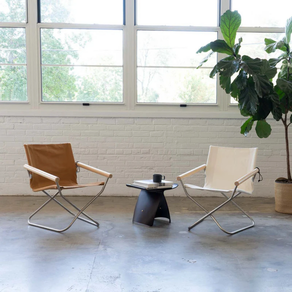 The chair is so comfortable, you forget it is a folding chair. The comfort comes from a combination of thoughtfully chosen height and angle of the armrests; the backrest's curvature, which supports the natural position of the spine; and seat height that allows you to firmly place both feet on the ground. 