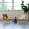 The chair is so comfortable, you forget it is a folding chair. The comfort comes from a combination of thoughtfully chosen height and angle of the armrests; the backrest's curvature, which supports the natural position of the spine; and seat height that allows you to firmly place both feet on the ground. 