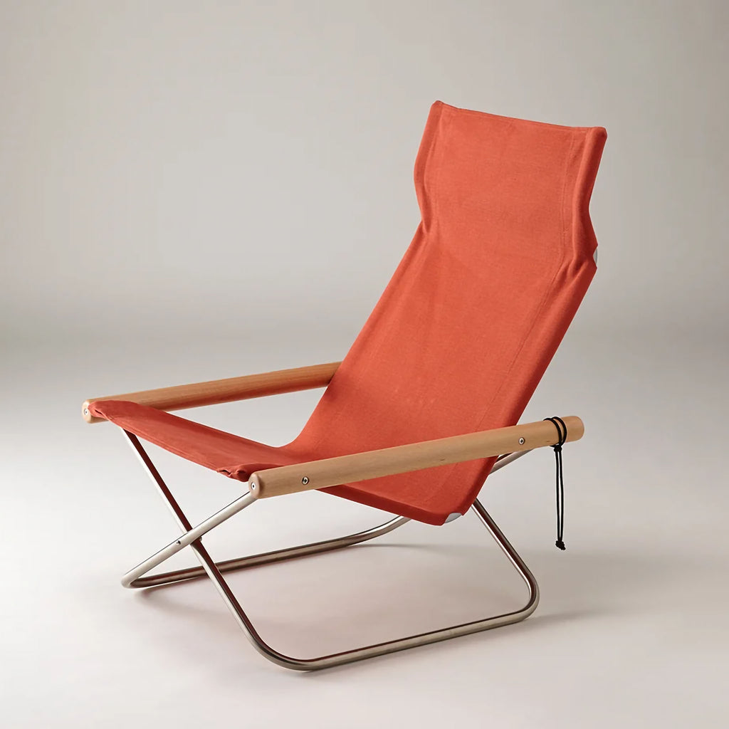Nychair X Terracotta. The first, and the most iconic Nychair X model, designed in 1970.

This model has the lowest seat height and a center of gravity across all models, giving a sense of grounding. 
The chair features generous seat depth and a high back to support the whole body and allow for deep relaxation, especially when paired with an Ottoman. SKU NY-102.