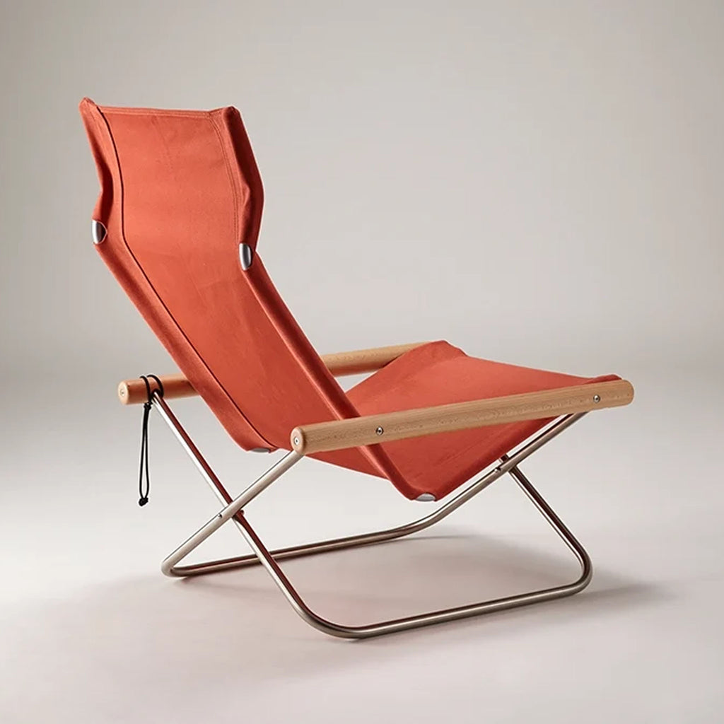 The angles and materials of each seat, armrest, and backrest are carefully crafted to support the body. The fabric adjusts itself to the shape and weight of the user's body, embracing it gently. The soft seat surface and smooth wooden armrests are pleasant to touch.
