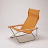 Nychair X Camel. SKU NY-126. The first, and the most iconic Nychair X model, designed in 1970.

This model has the lowest seat height and a center of gravity across all models, giving a sense of grounding. 
The chair features generous seat depth and a high back to support the whole body and allow for deep relaxation, especially when paired with an Ottoman.
