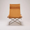 The first, and the most iconic Nychair X model, designed in 1970.

This model has the lowest seat height and a center of gravity across all models, giving a sense of grounding. 
The chair features generous seat depth and a high back to support the whole body and allow for deep relaxation, especially when paired with an Ottoman.