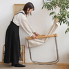 The chair can be easily folded into a thickness of as little as 15-22 cm, which can still stand on its own and can be stored away into a narrow space. Folded chair can also be carried more easily, and with a weight of just 6-6.5 kg, it can be handled with ease by most users.