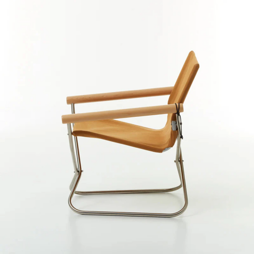The chair is so comfortable, you forget it is a folding chair. The comfort comes from a combination of thoughtfully chosen height and angle of the armrests; the backrest's curvature, which supports the natural position of the spine; and seat height that allows you to firmly place both feet on the ground. 