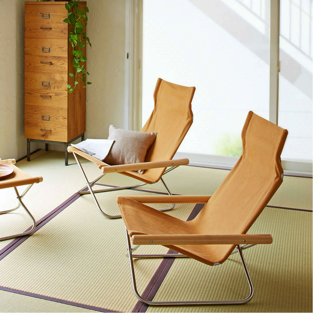Nychair X may be built with simple parts, but they are crafted with precision that can only be achieved with advanced technologies. The manufacturing processes are run in Japan.

The angles and materials of each seat, armrest, and backrest are carefully crafted to support the body. The fabric adjusts itself to the shape and weight of the user's body, embracing it gently.The soft seat surface and smooth wooden armrests are pleasant to touch.