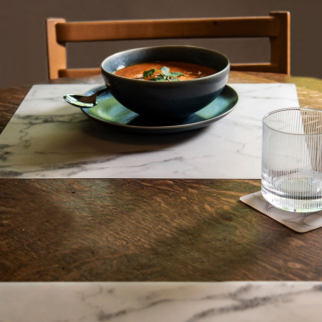 This forgiving placemat protects your surfaces from heat & water damage with silky soft, memory-free silicone that never wears or tears. The nonporous & germ-free mat repels the biggest spills & wipes clean with ease, leaving you free to enjoy the subtle designs & rich colors for many years to come.
