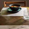 This forgiving placemat protects your surfaces from heat & water damage with silky soft, memory-free silicone that never wears or tears. The nonporous & germ-free mat repels the biggest spills & wipes clean with ease, leaving you free to enjoy the subtle designs & rich colors for many years to come.