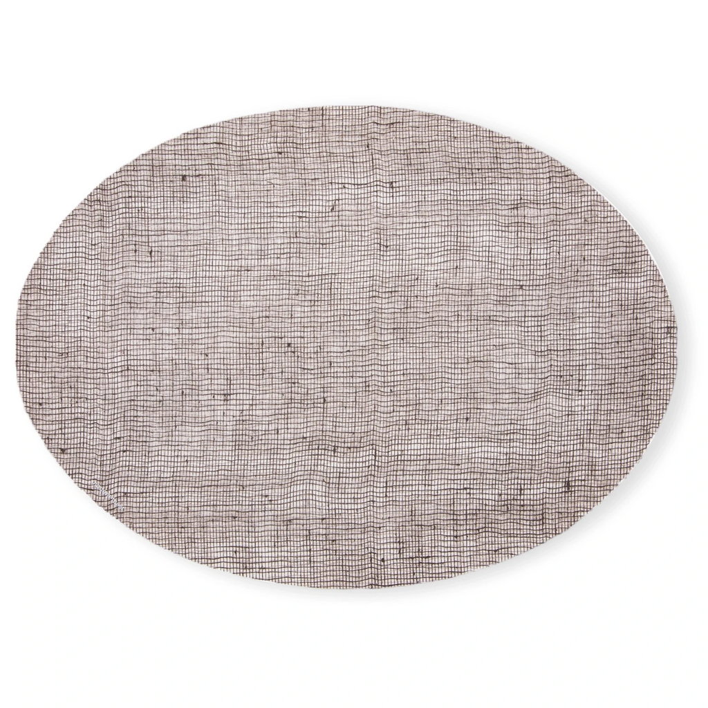 Made from plastic-free silicone & hand printed, the modern-twist linen print placemat in the oval shape delivers eco-friendly, elegant style to your home. SKU PMOV001.