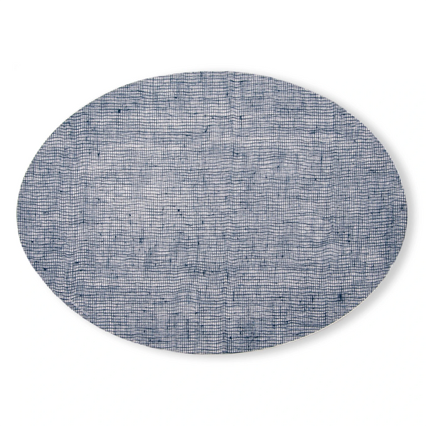 Made from plastic-free silicone & hand printed, the modern-twist linen print placemat in the oval shape delivers eco-friendly, elegant style to your home. SKU PMOV002.