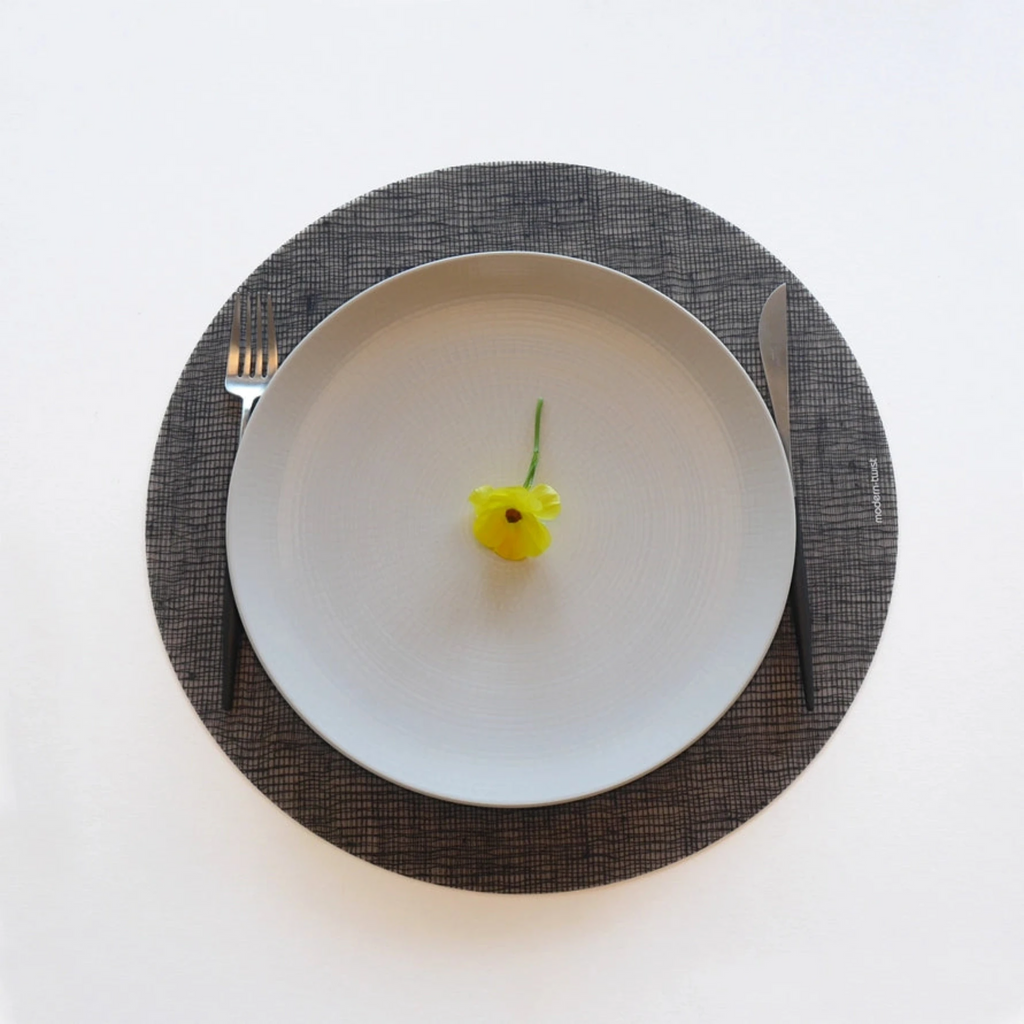 Made from plastic-free silicone & hand printed, the modern-twist linen print placemat in the oval shape delivers eco-friendly, elegant style to your home. Bring beauty to your table with this soft, beautifully translucent pattern that enhances any surface while keeping lead, latex, phthalates, BPAs + other harsh chemicals far away from your dinner. 